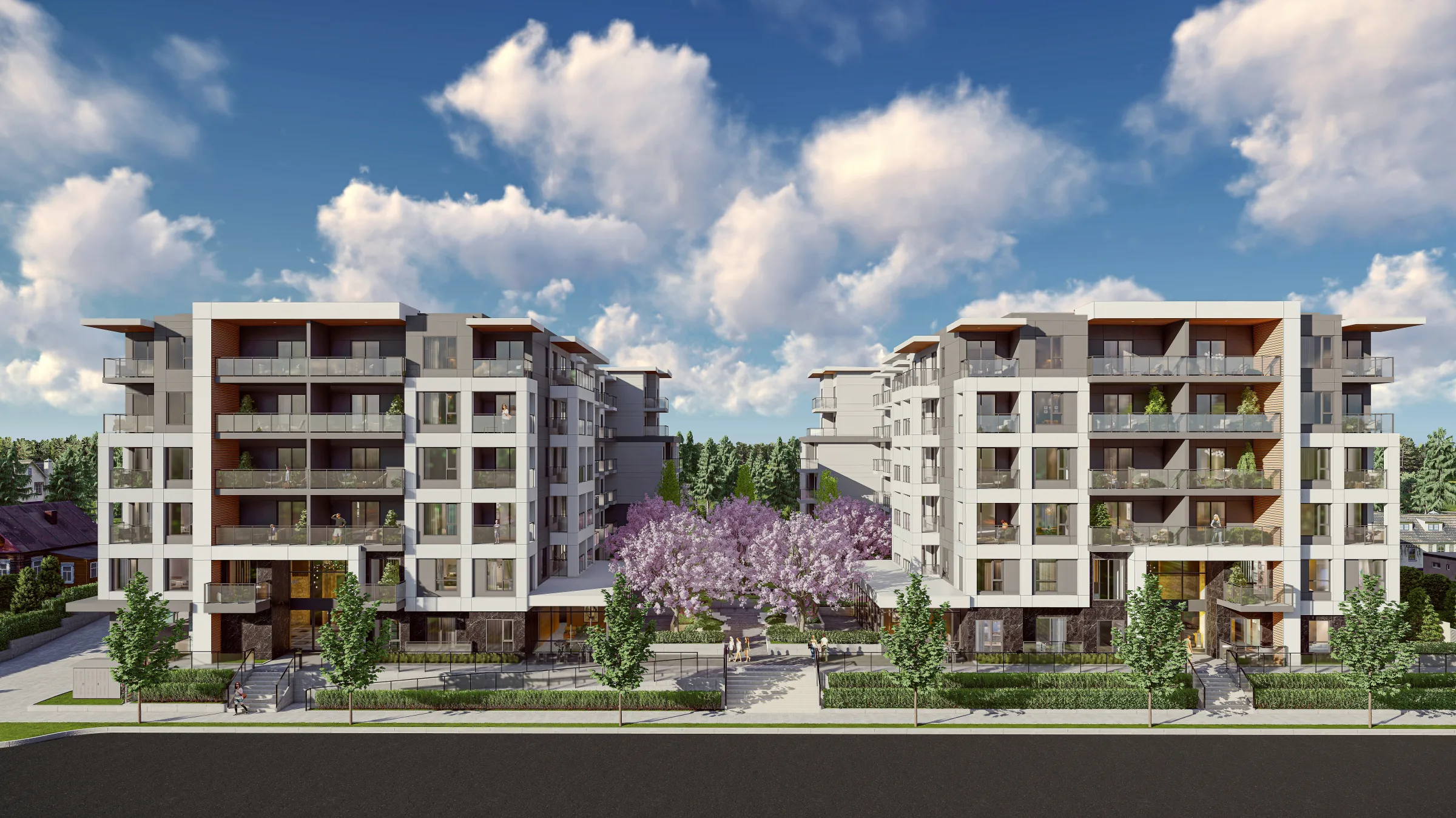 Kamilia — two mid-rise condominium buildings around a blossom-lined courtyard